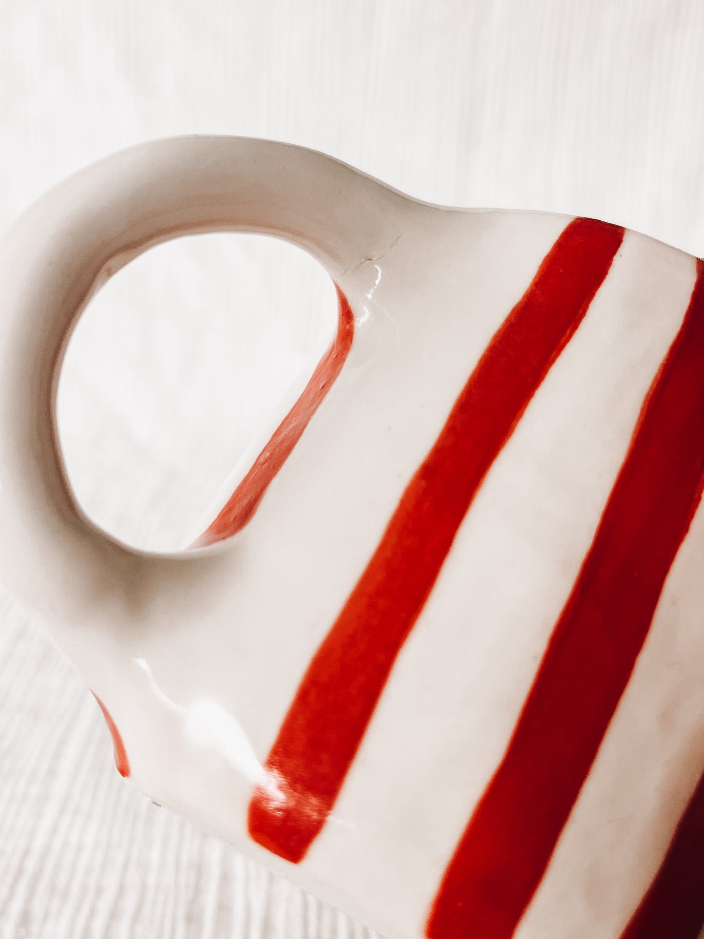 Red striped hug mug-defect