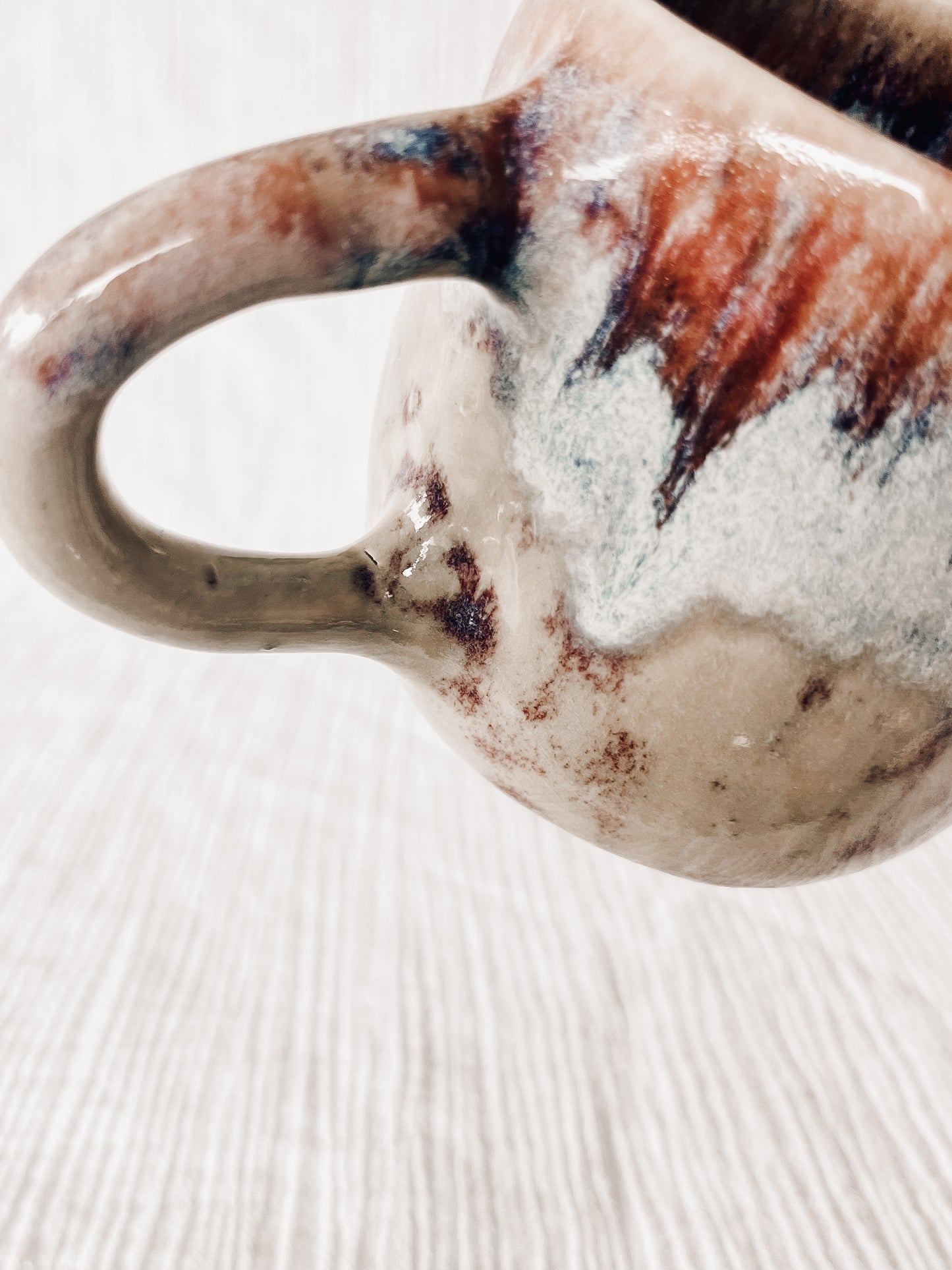 Multi coloured flux hug mug-defect